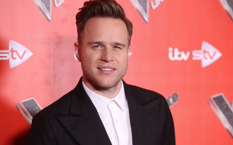 Olly Murs, ilişkisinde çok mutlu olduğunu söyledi.